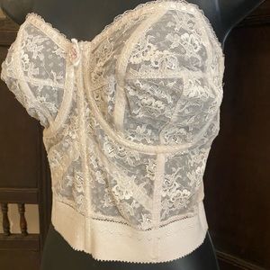 Vintage 1950’s lace corset manufactured by Surprise.  Semi-sheer, 40B